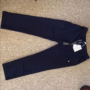 Women’s navy yola- petite skinny scrub pants